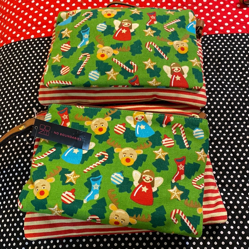 Set of two! Super cute canvas Holiday themed bags. I am offering two set…